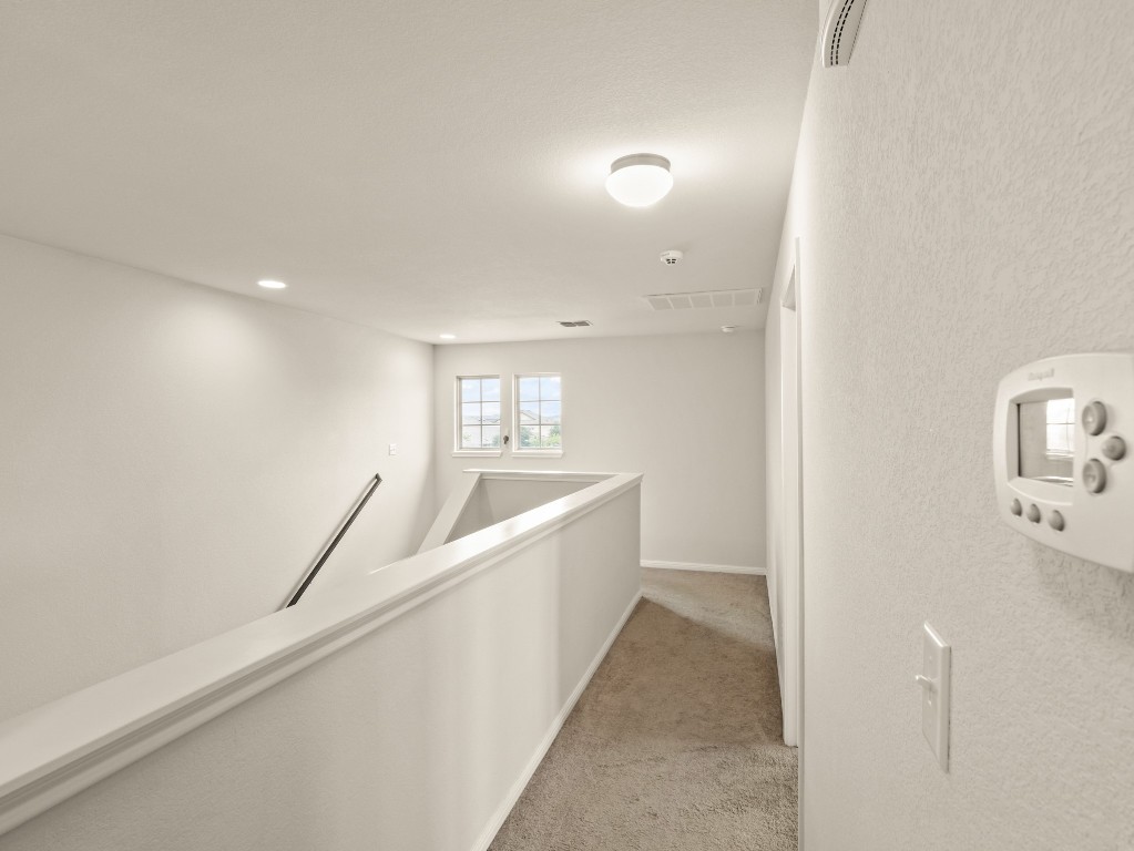 574 Nautical Loop Kyle, TX 78640 - Photo 16 of 23 a bathroom with a bathtub and a sink