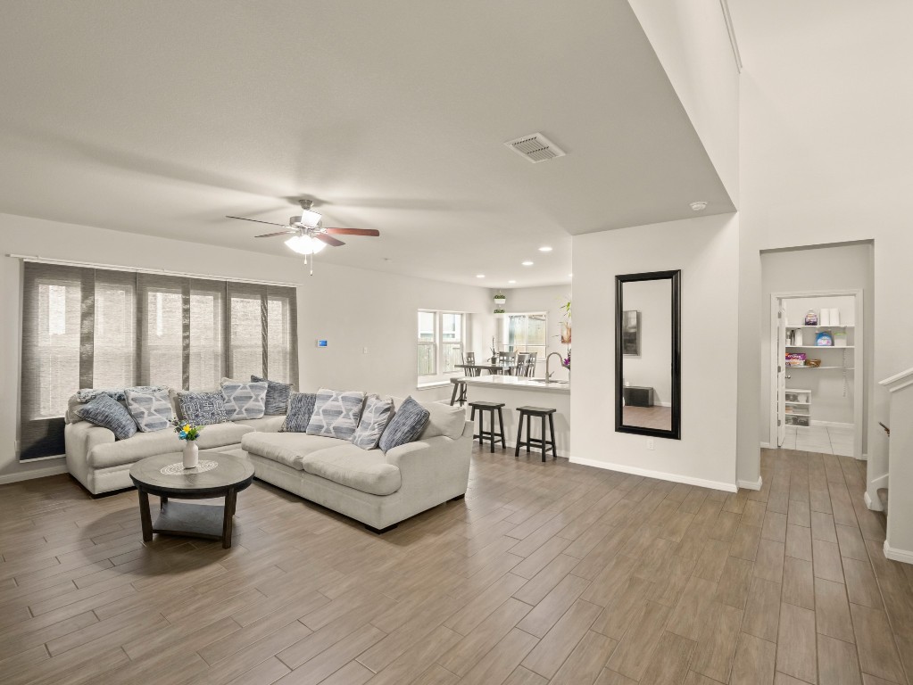 574 Nautical Loop Kyle, TX 78640 - Photo 19 of 23 a living room with furniture and view of kitchen