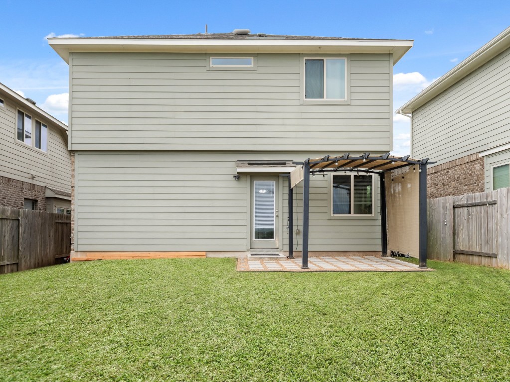 574 Nautical Loop Kyle, TX 78640 - Photo 4 of 23 a view of a house with a yard