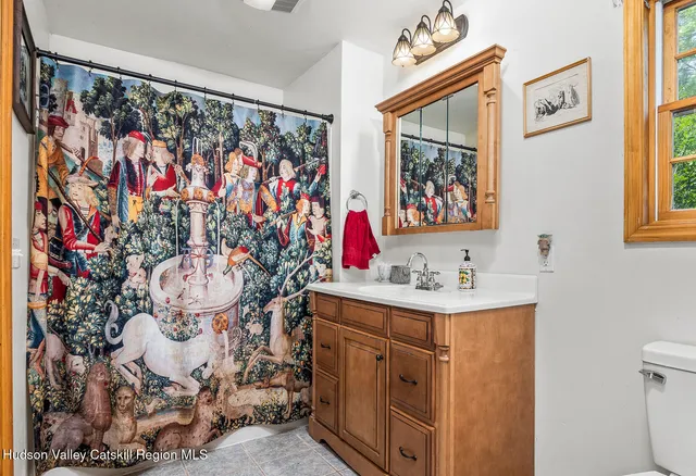 an aerial view of a house with swimming pool