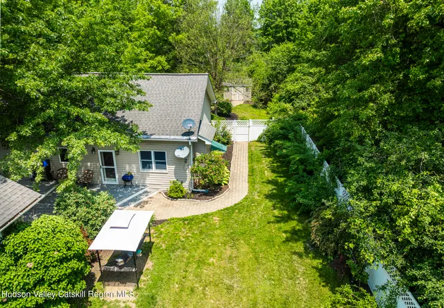 a view of swimming pool with a patio