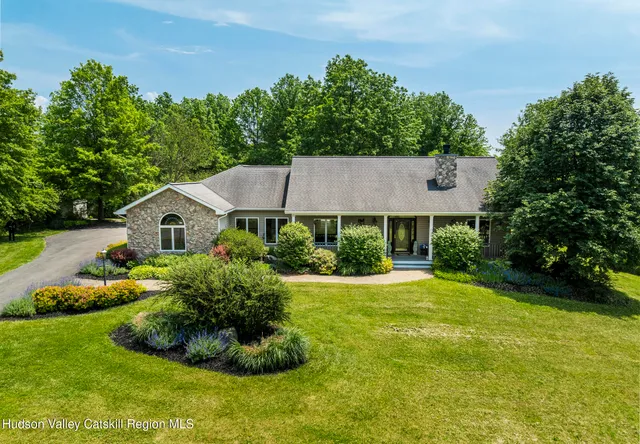 a view of a swimming pool with a garden