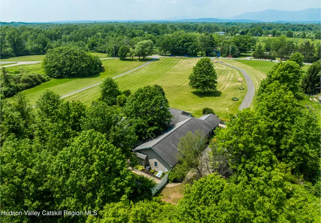 a view of a golf course with a garden