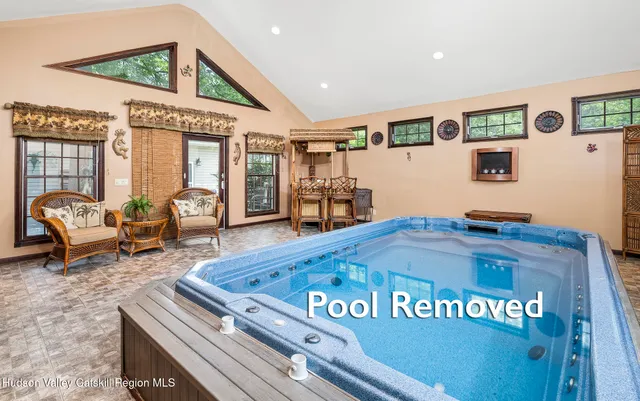 a living room with furniture and a table