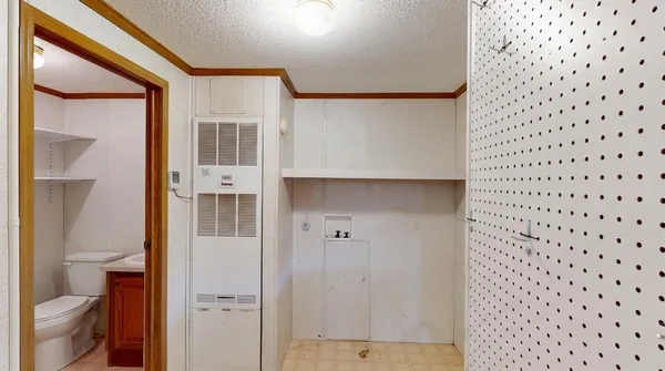a view of balcony with wooden floor and staircase