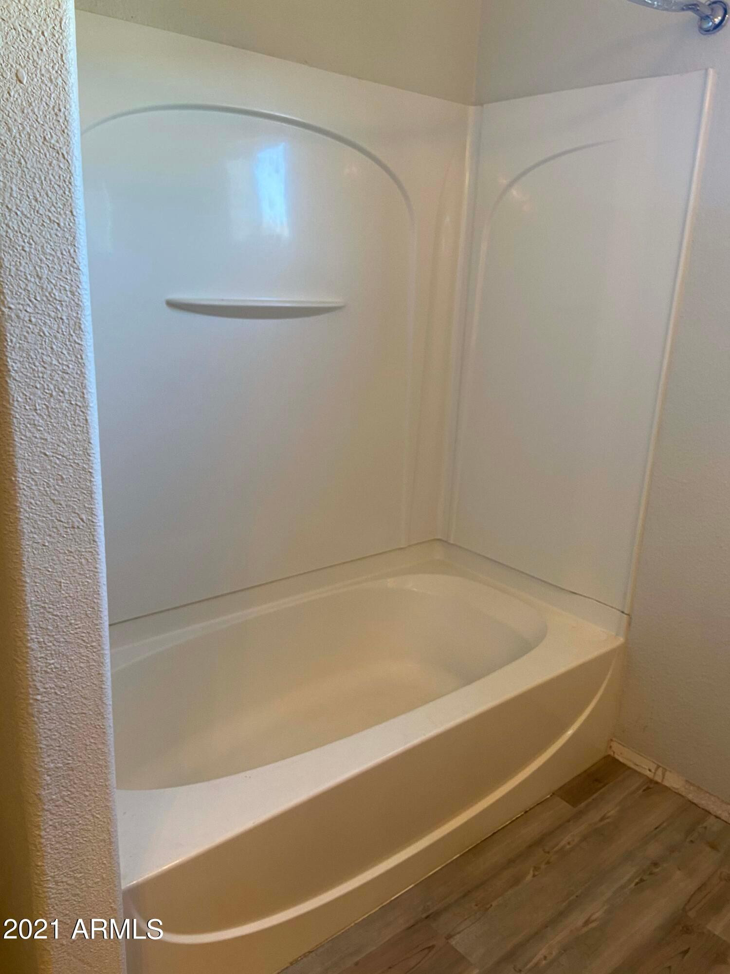 2929 North 37th Street, Unit 1 Phoenix, AZ 85018 - Photo 11 of 17 a bathroom with a bathtub