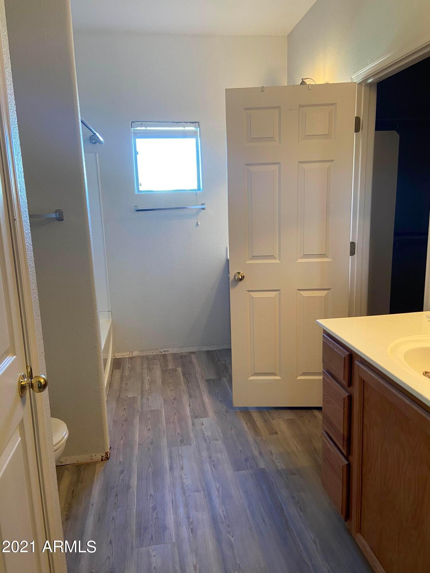 2929 North 37th Street, Unit 1 Phoenix, AZ 85018 - Photo 10 of 17 view of a bathroom with a sink and a toilet