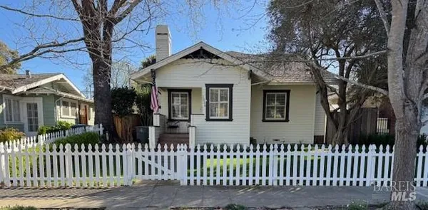 a front view of house yard and deck