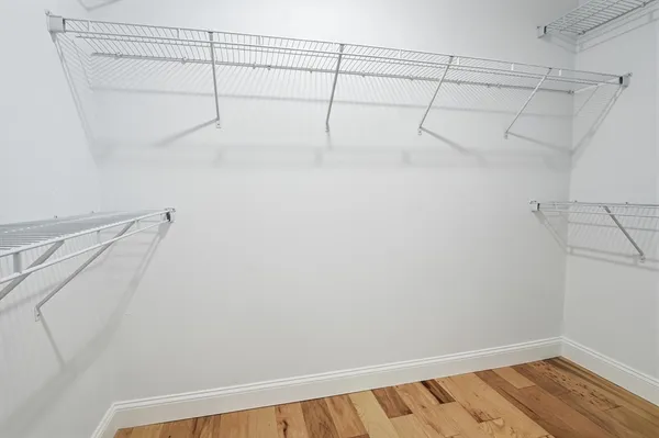 a view of a room with racks on the wall