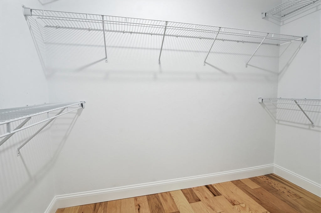 12 Benham Street Worcester, MA 01604 - Photo 13 of 26 a view of a room with racks on the wall