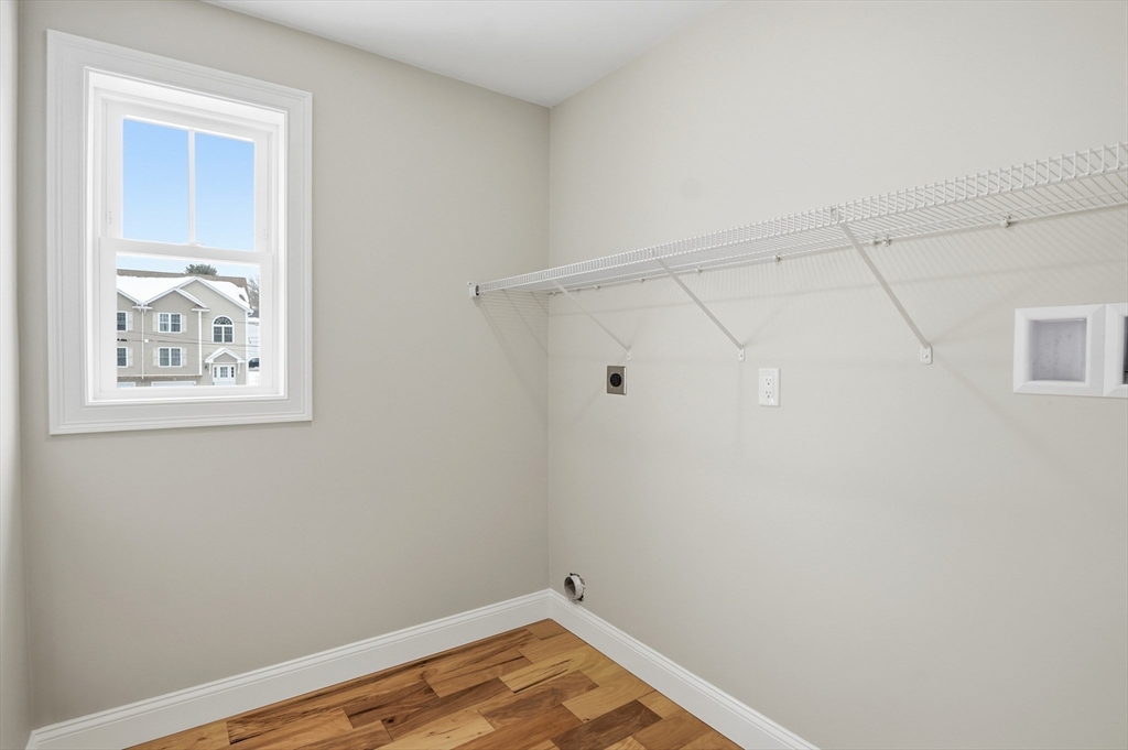 12 Benham Street Worcester, MA 01604 - Photo 17 of 26 a view of small space with racks on the wall
