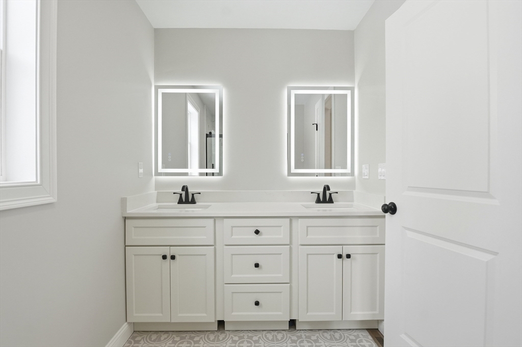 12 Benham Street Worcester, MA 01604 - Photo 19 of 26 a view of bathroom with dual sinks