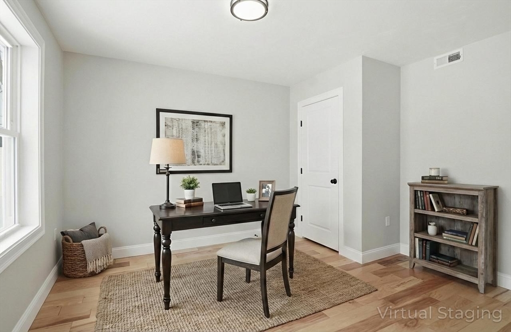 12 Benham Street Worcester, MA 01604 - Photo 9 of 26 a workspace with furniture and window