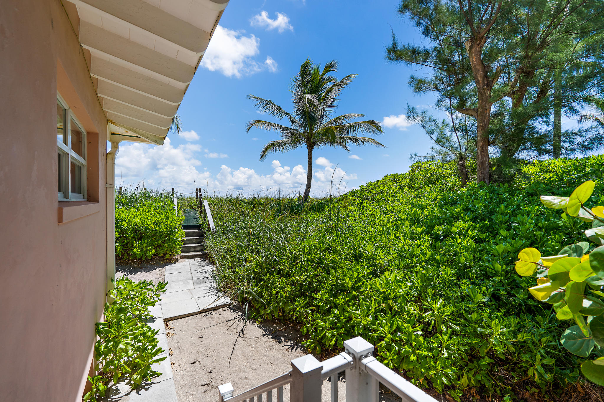 55 North Beach Road Hobe Sound, FL 33455 - Photo 42 of 64 path outside 1st bath