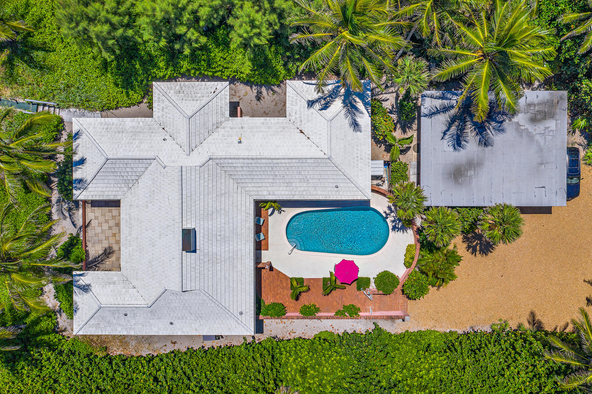 55 North Beach Road Hobe Sound, FL 33455 - Photo 53 of 64 side aerial of house