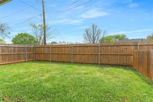 a view of a backyard with a garden