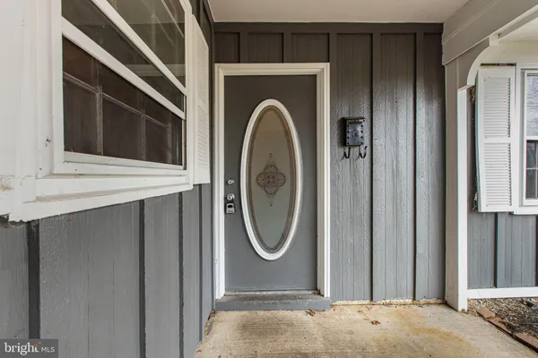 a front view of a house with washer and dryer
