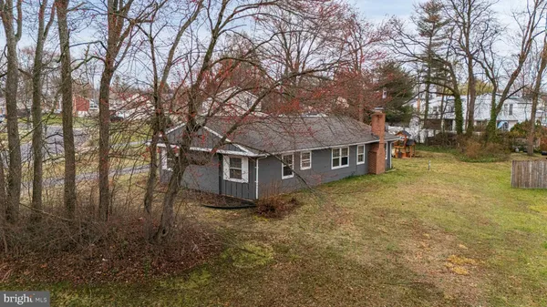 an aerial view of residential house with outdoor space