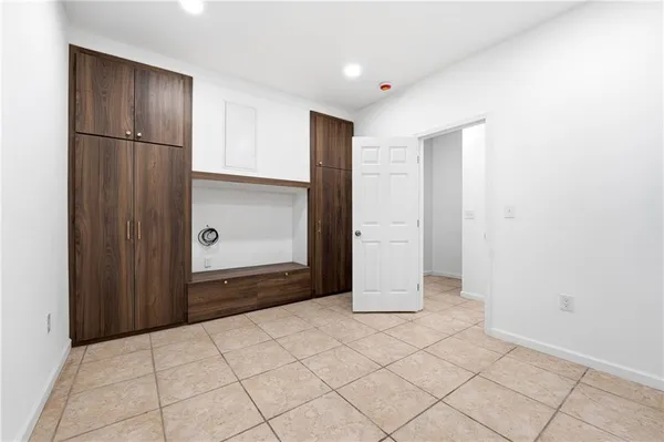 an empty room with closet