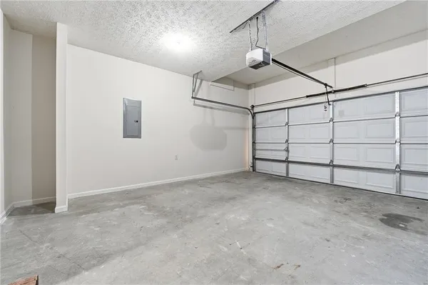 a balcony with wooden floor and fence