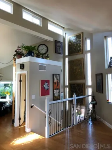 a kitchen with a sink cabinets and a large window