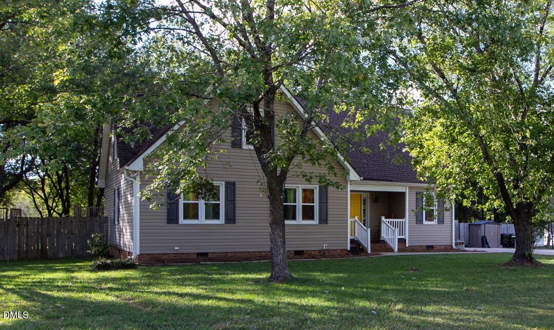764 Corbett Road Clayton, NC 27520 - Photo 1 of 65 front view of a house with a yard