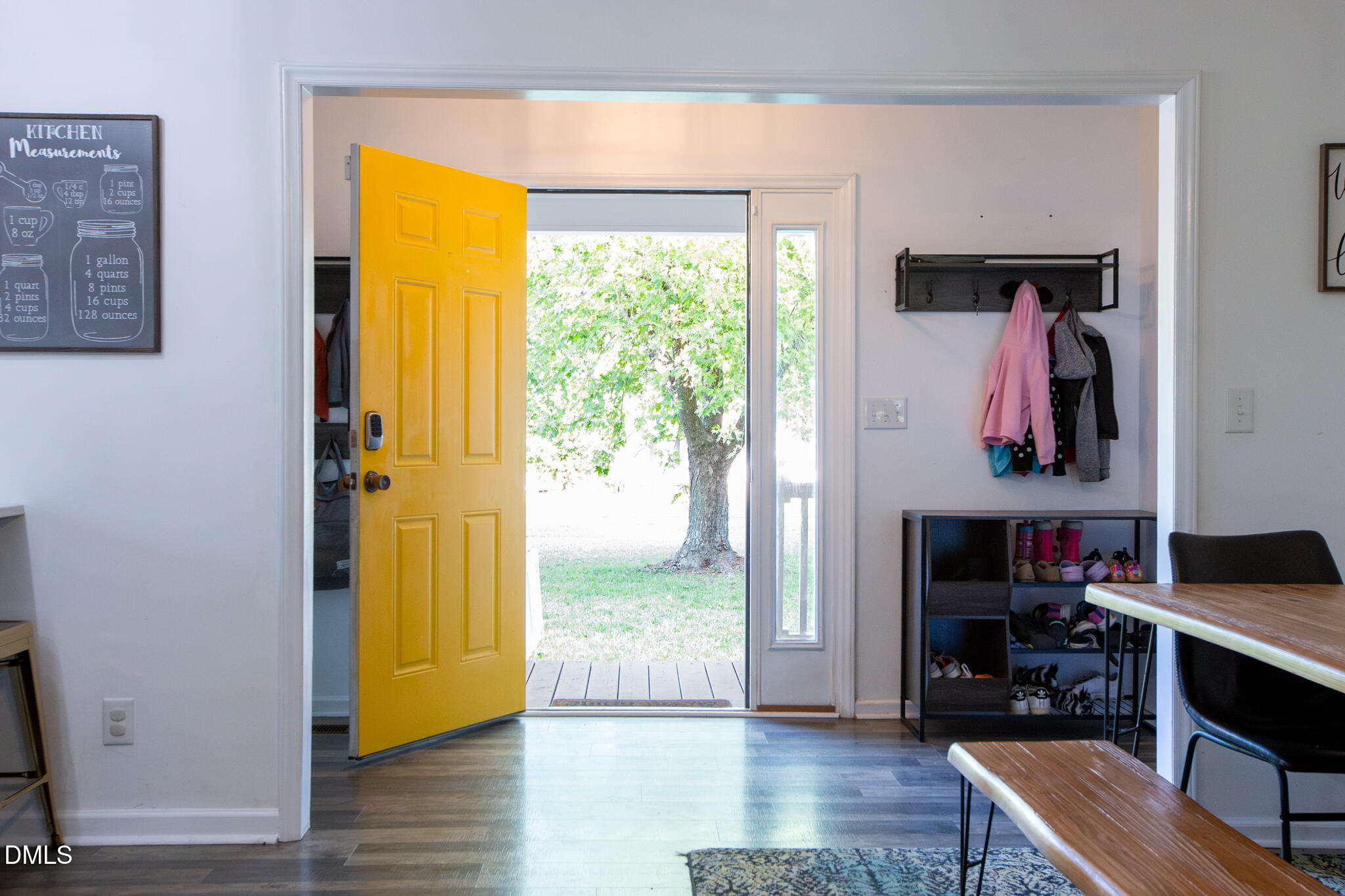 764 Corbett Road Clayton, NC 27520 - Photo 14 of 65 a view of living room with furniture and window