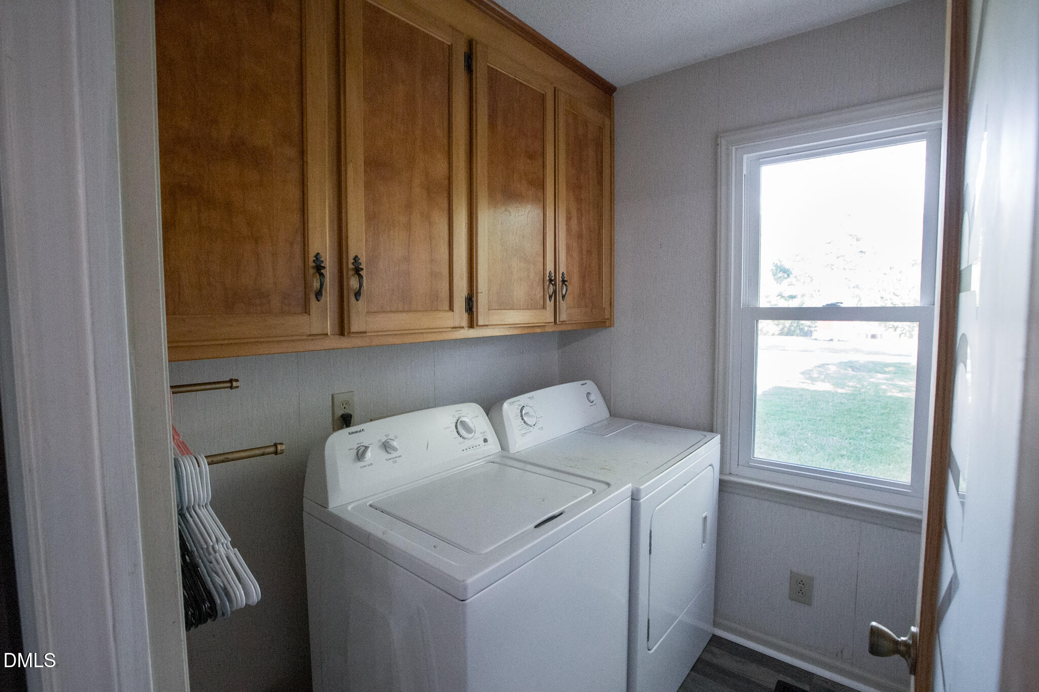 764 Corbett Road Clayton, NC 27520 - Photo 15 of 65 a utility room with dryer and washer