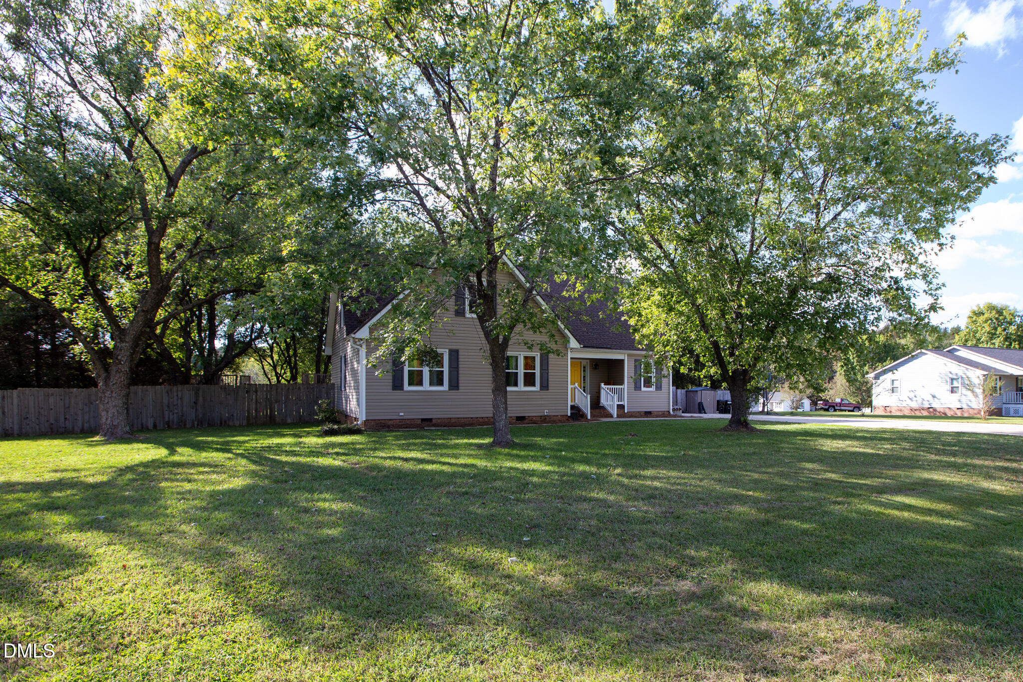 764 Corbett Road Clayton, NC 27520 - Photo 2 of 65 a house view with a sitting space and a trees