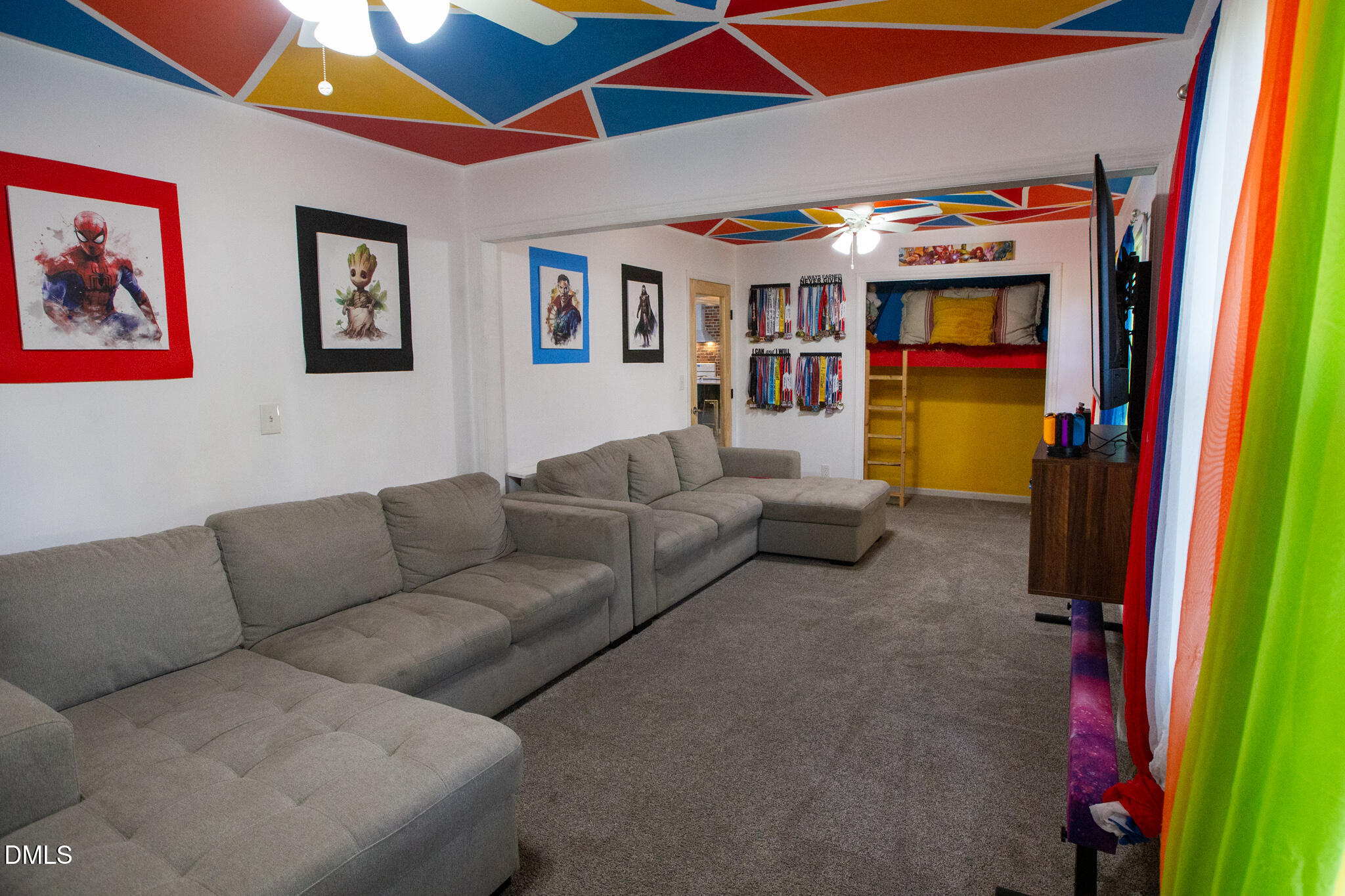 764 Corbett Road Clayton, NC 27520 - Photo 23 of 65 a living room with furniture and a ceiling fan