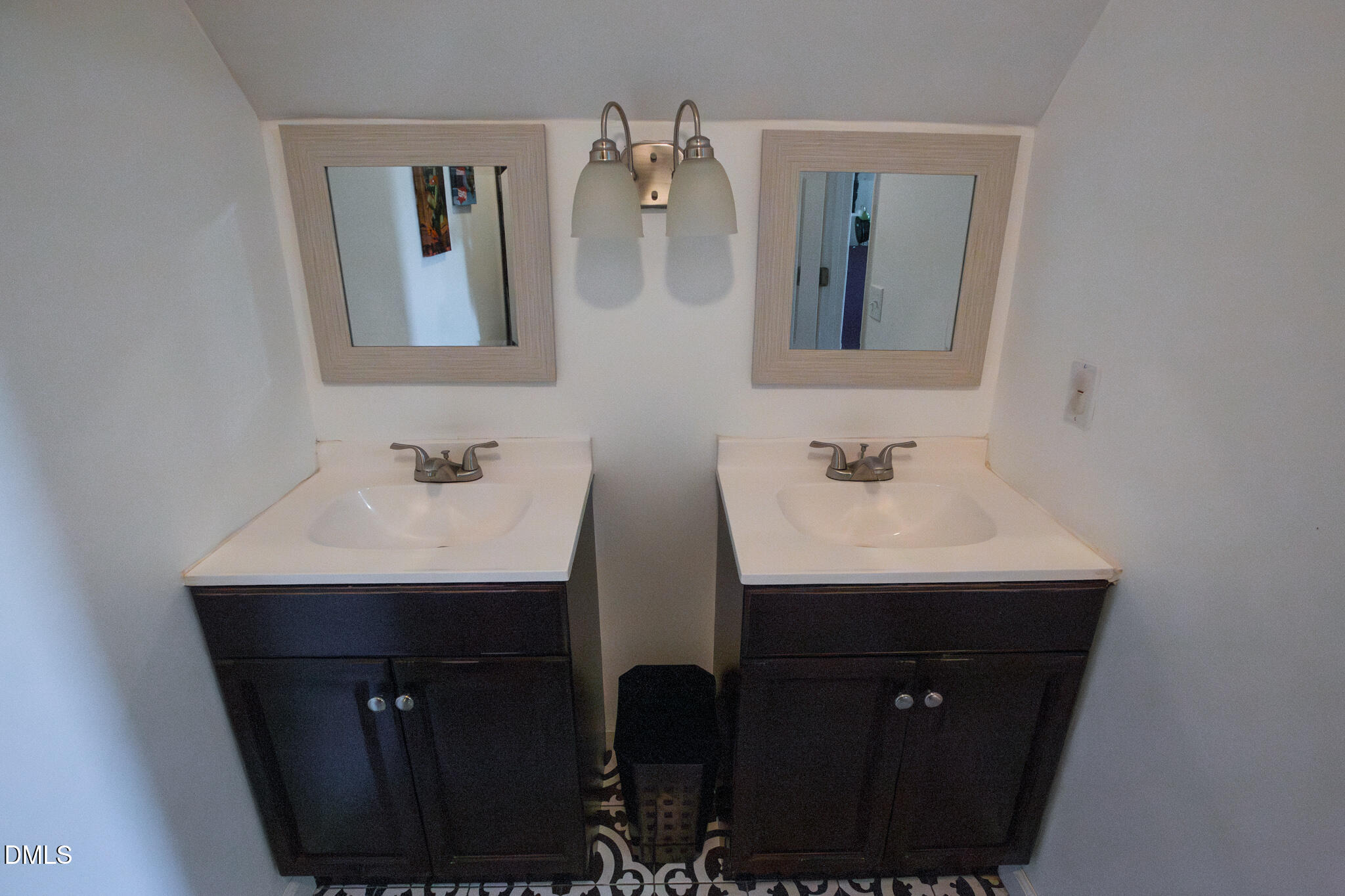 764 Corbett Road Clayton, NC 27520 - Photo 39 of 65 a bathroom with a sink and a mirror