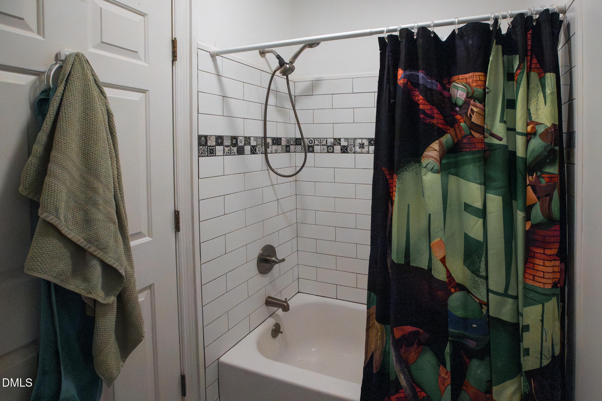 764 Corbett Road Clayton, NC 27520 - Photo 40 of 65 a bathroom with a shower and a sink