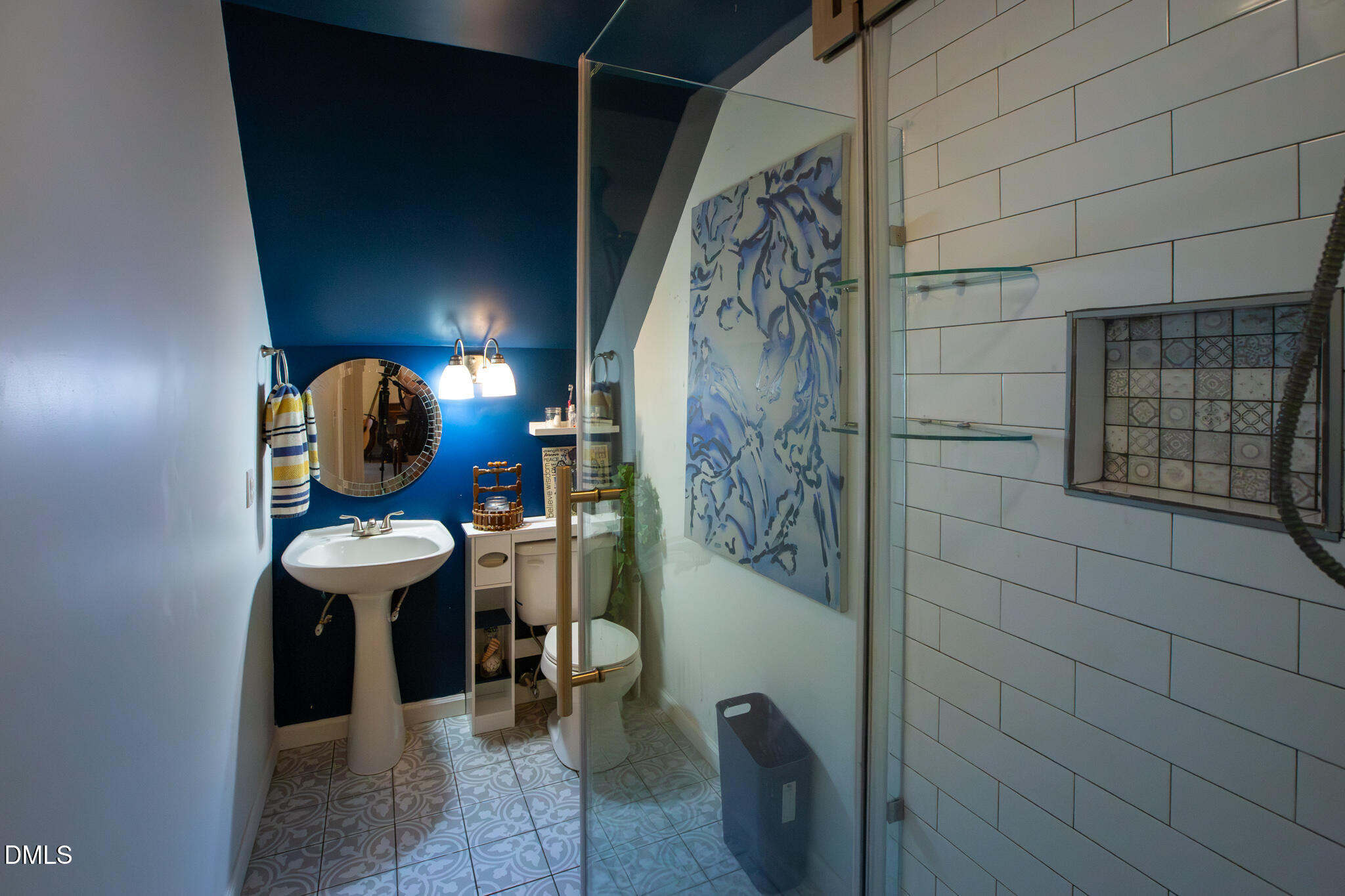 764 Corbett Road Clayton, NC 27520 - Photo 45 of 65 a view of bathroom with shower and mirror