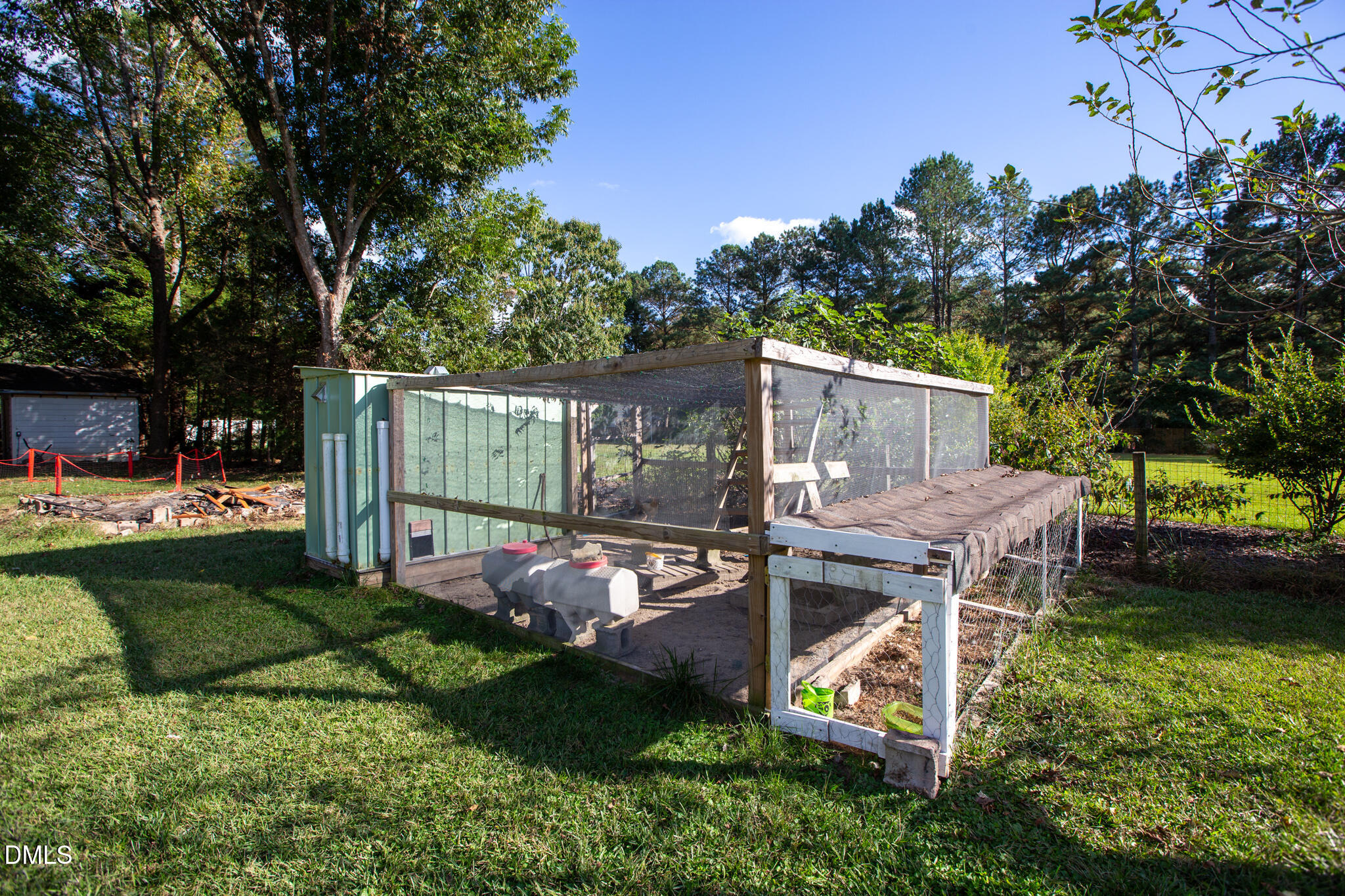 764 Corbett Road Clayton, NC 27520 - Photo 57 of 65 an aerial view of a house with swimming pool garden and patio