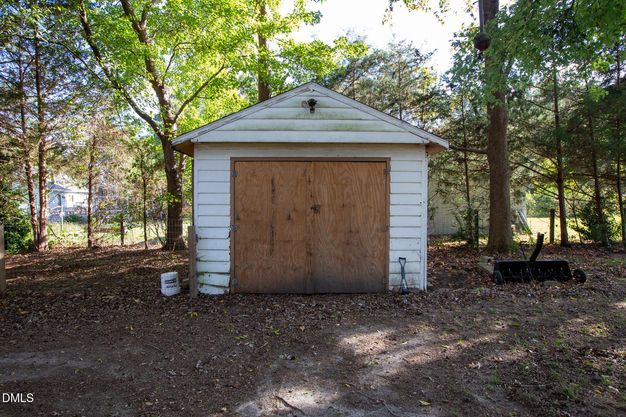 764 Corbett Road Clayton, NC 27520 - Photo 61 of 65 a front view of a house with a yard and garage