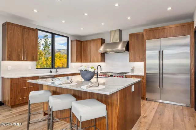 a living room with fireplace furniture and a flat screen tv