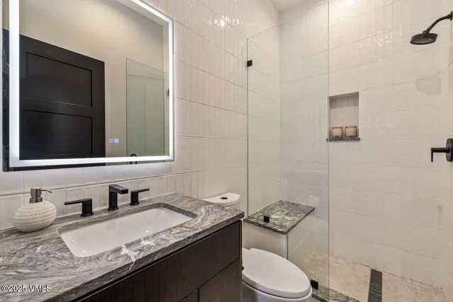 a bathroom with a sink and a toilet