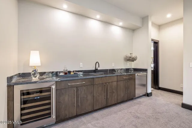 a living room with furniture gym equipment and a flat screen tv