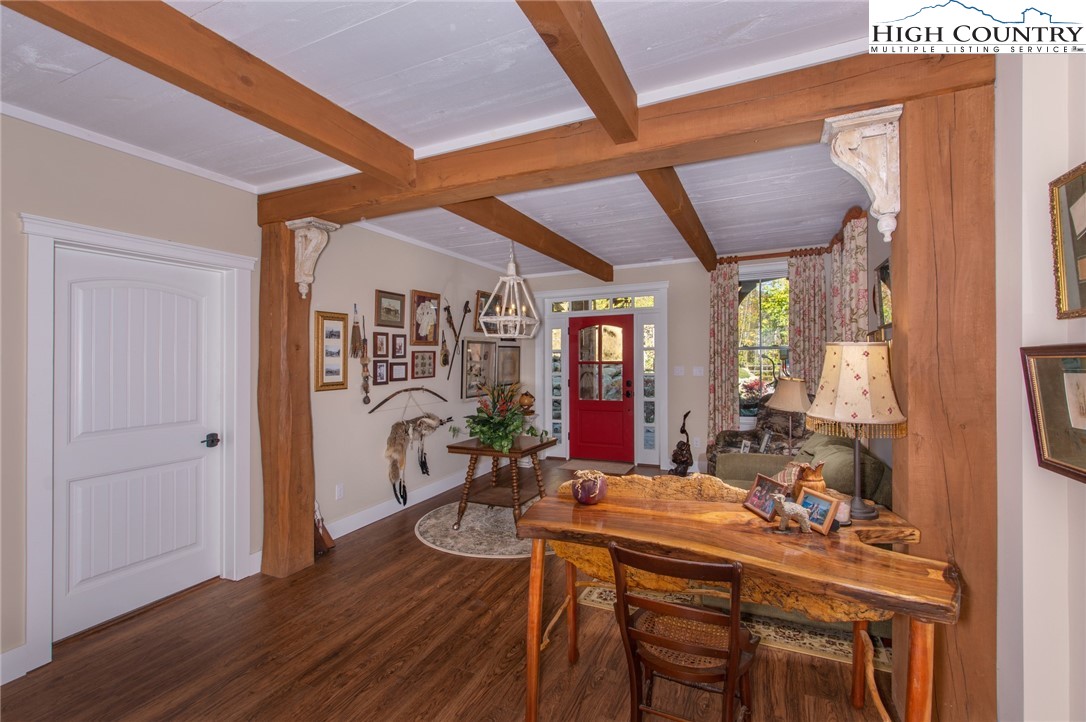 2709 Buckeye Road Elk Park, NC 28622 - Photo 25 of 43 a view of a dining room with furniture window and wooden floor