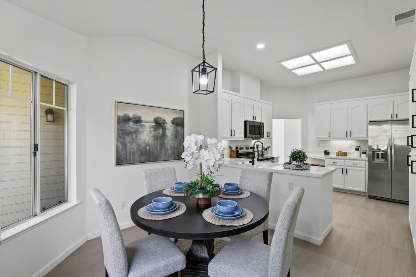 8611 Vineyard Ridge Place San Jose, CA 95135 - Photo 11 of 49 a view of a dining room with furniture