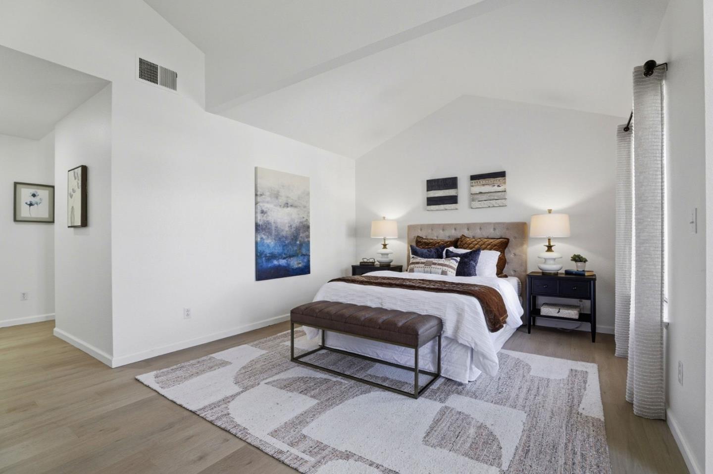 8611 Vineyard Ridge Place San Jose, CA 95135 - Photo 16 of 49 a bed room with a bed and a night stand