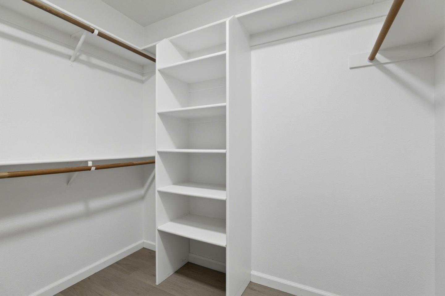 8611 Vineyard Ridge Place San Jose, CA 95135 - Photo 18 of 49 a view of walk in closet with empty racks