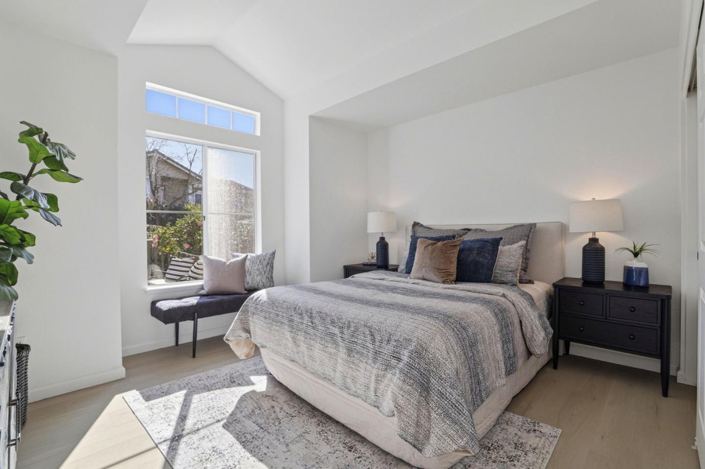 8611 Vineyard Ridge Place San Jose, CA 95135 - Photo 20 of 49 a bedroom with bed and windows