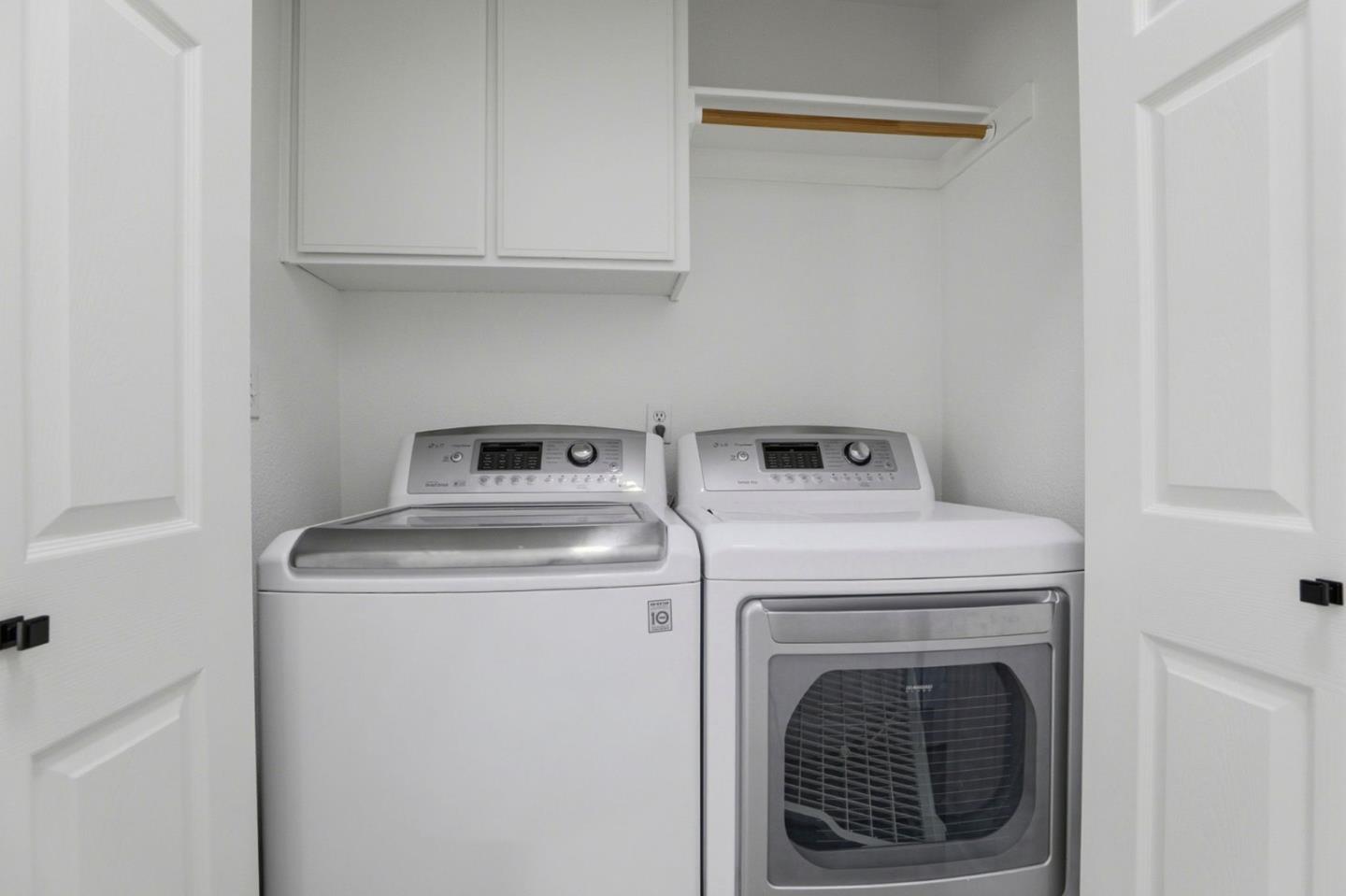 8611 Vineyard Ridge Place San Jose, CA 95135 - Photo 23 of 49 a utility room with dryer and washer