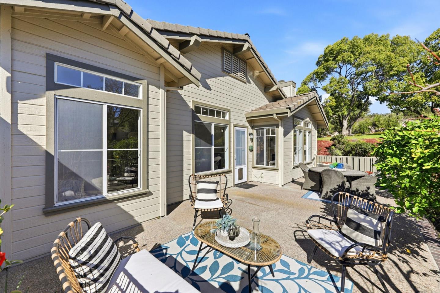 8611 Vineyard Ridge Place San Jose, CA 95135 - Photo 26 of 49 a view of a patio with table and chairs and potted plants