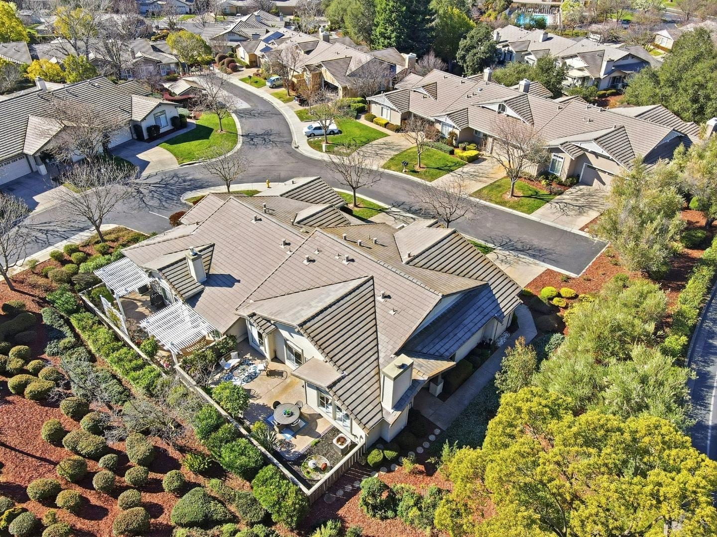 8611 Vineyard Ridge Place San Jose, CA 95135 - Photo 28 of 49 an aerial view of a house with a yard and lake view