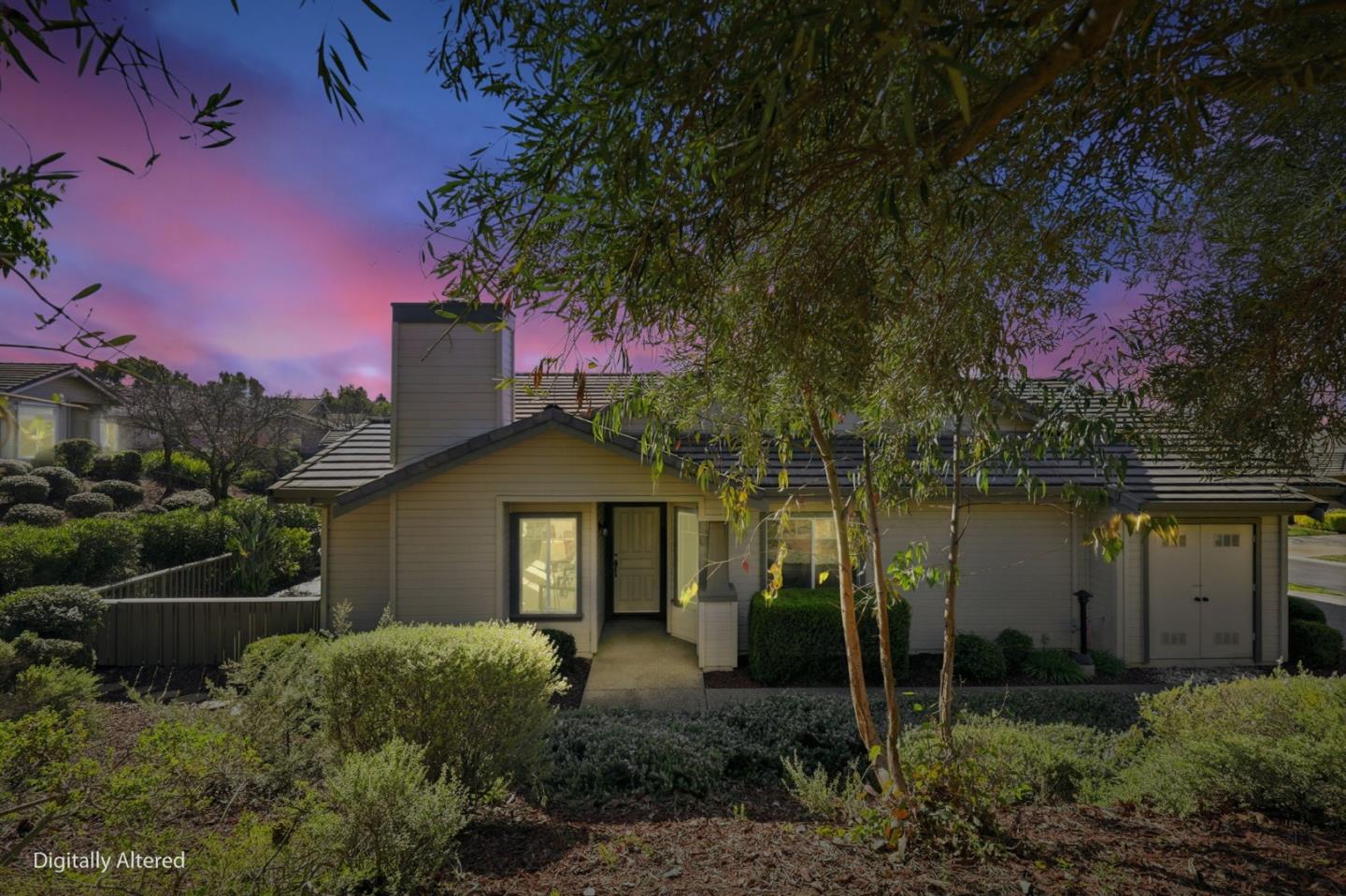 8611 Vineyard Ridge Place San Jose, CA 95135 - Photo 32 of 49 a front view of a house with a garden