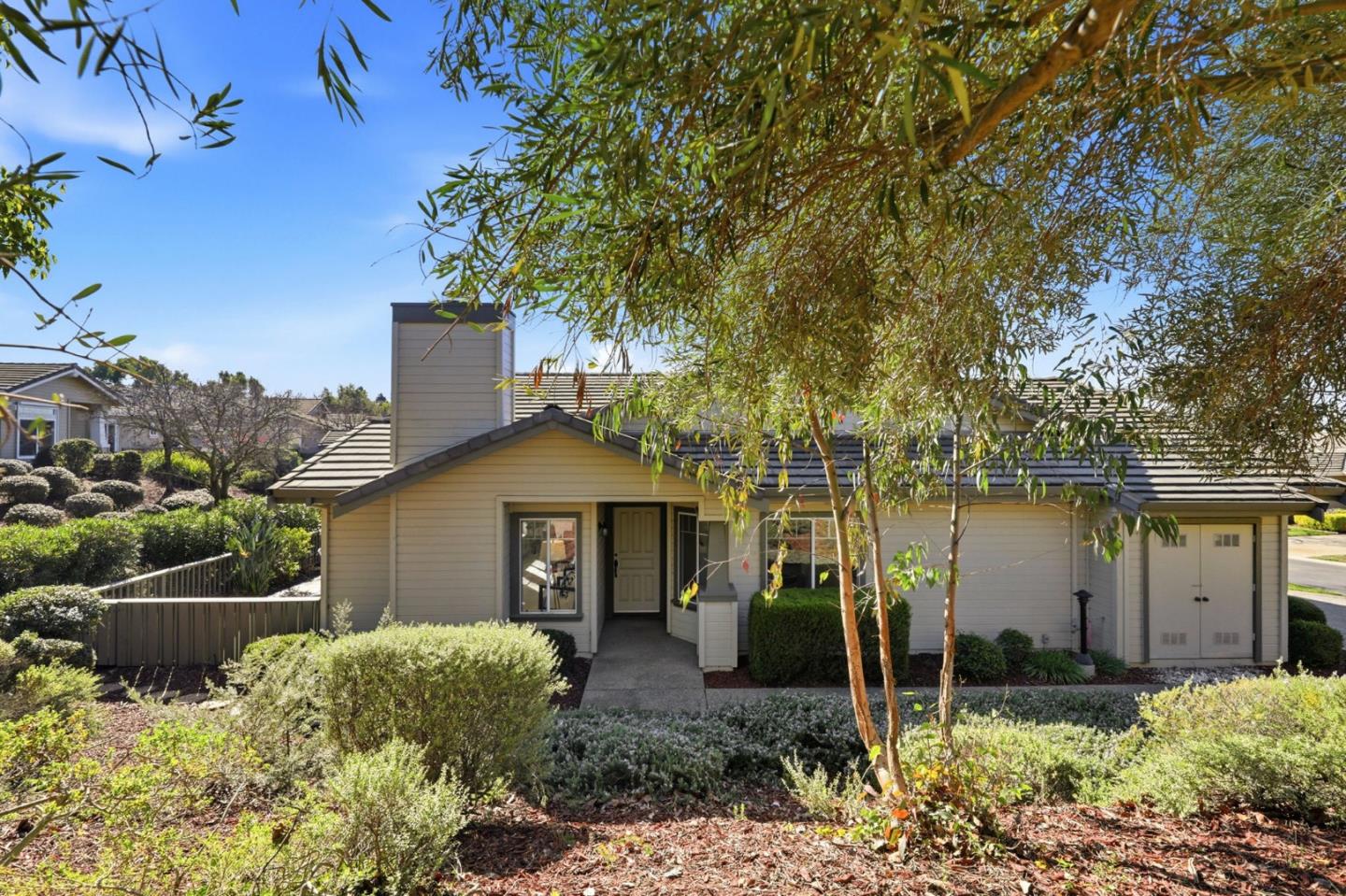 8611 Vineyard Ridge Place San Jose, CA 95135 - Photo 34 of 49 a front view of a house with garden