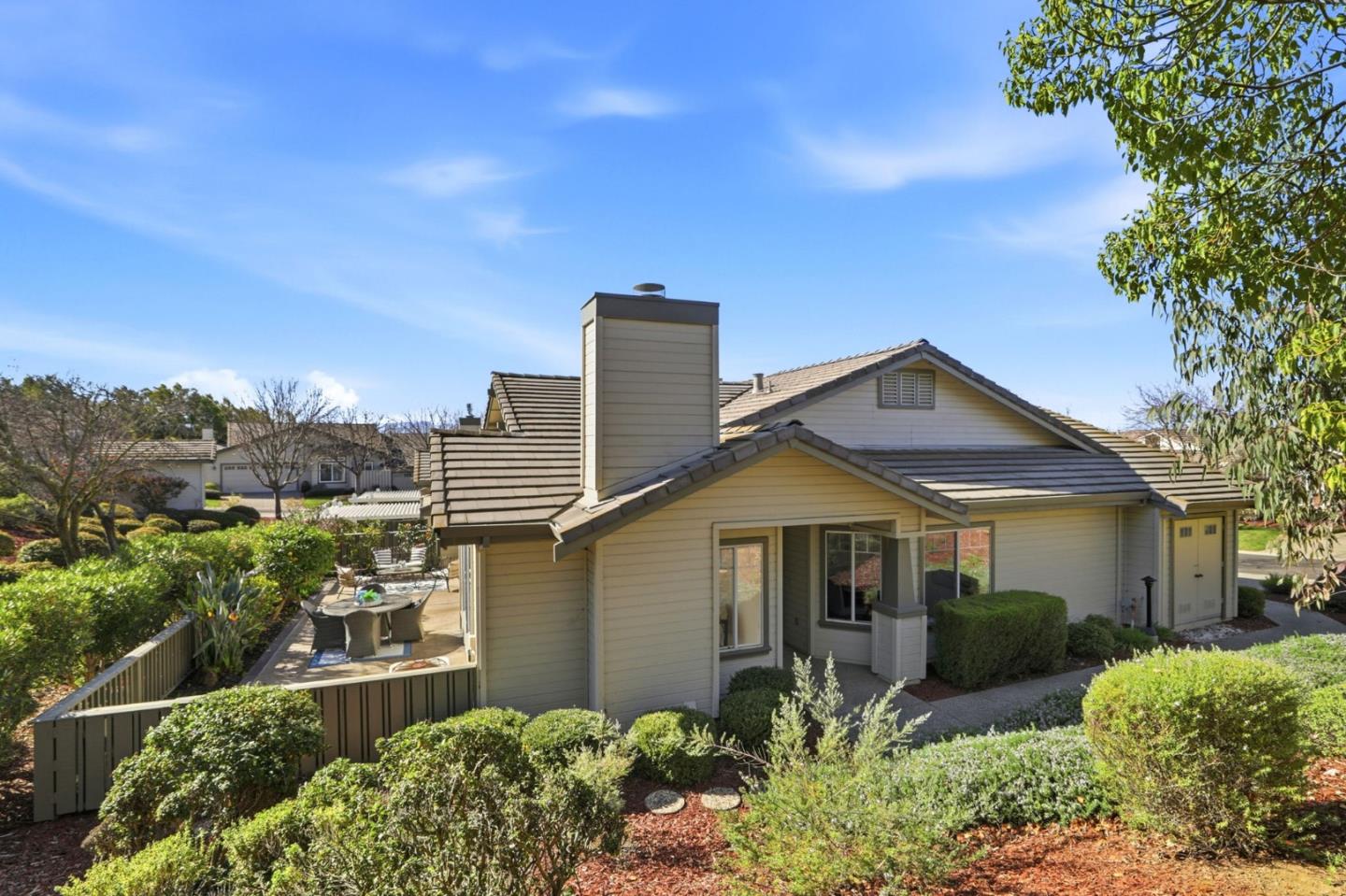 8611 Vineyard Ridge Place San Jose, CA 95135 - Photo 35 of 49 a front view of a house with a yard