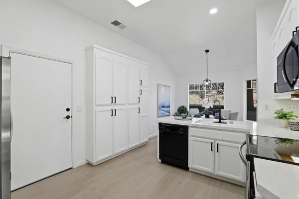a view of a dining room with furniture